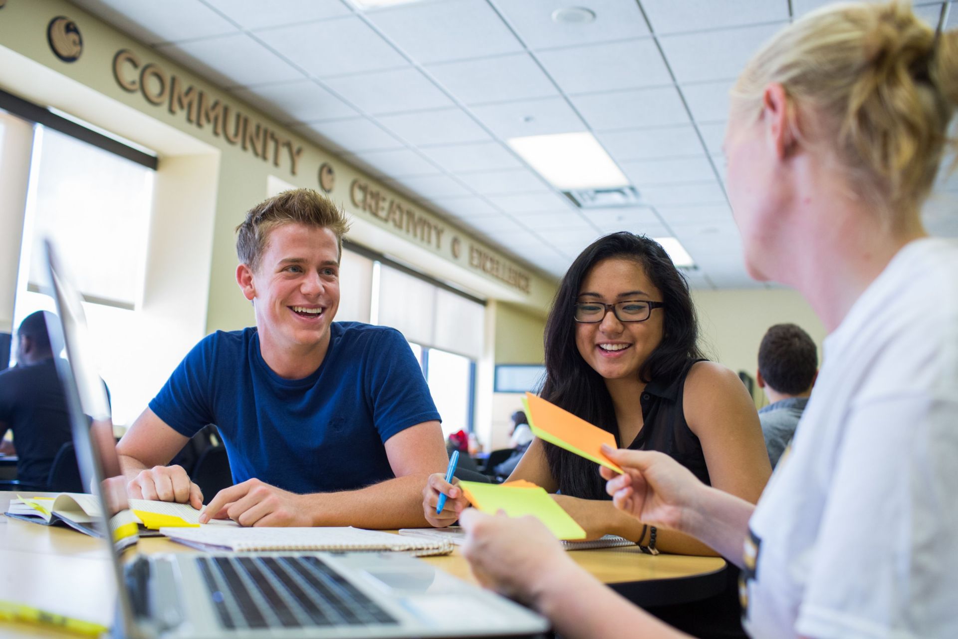 Three students study in the Student Union.