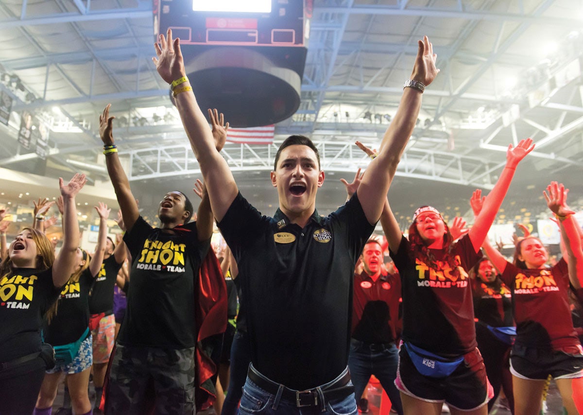 A group of enthusiastic students lead a dance at KnightThon