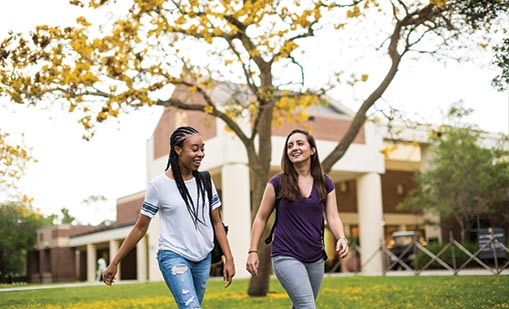 Students walking past the John T. Washington Center