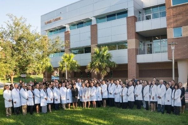 Medical and Nursing Staff in front of the Student Health Building