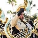 UCF football fans march to the stadium