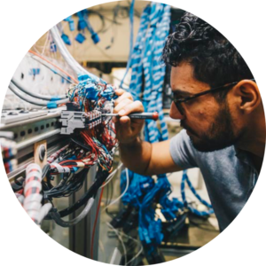 Electrical engineering student working on wires and cables