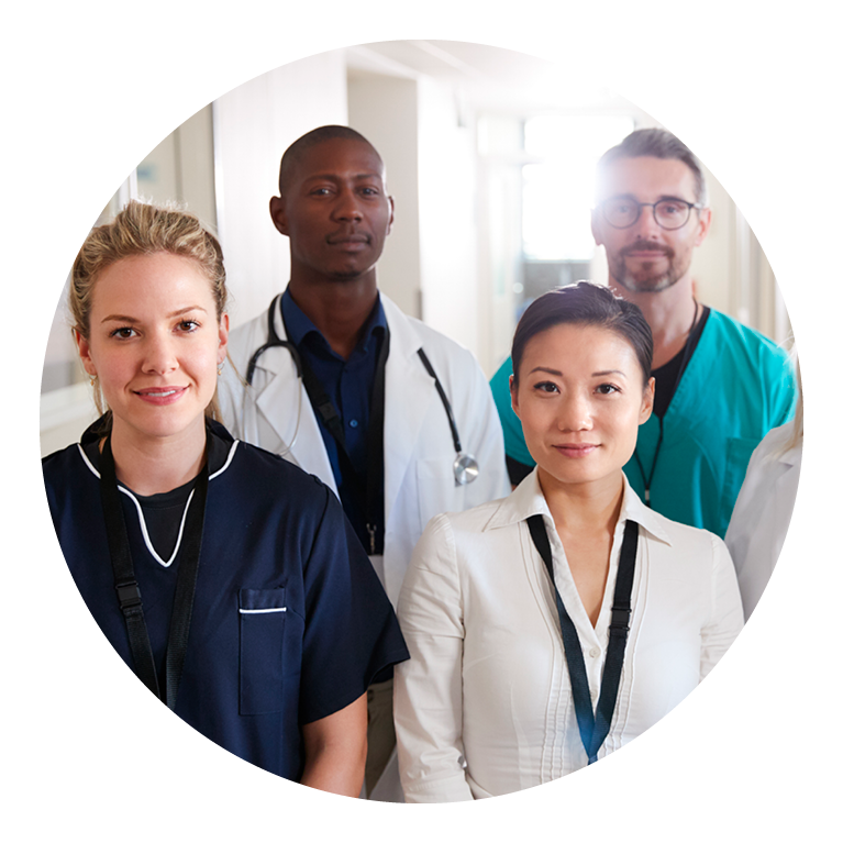 medical professionals smiling at the camera