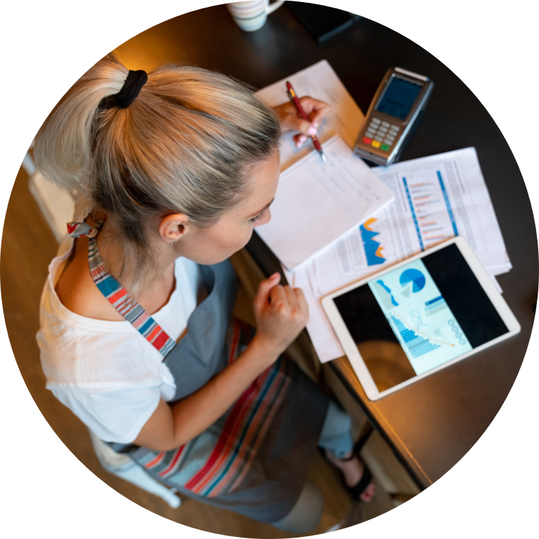 Female looking at charts on a tablet