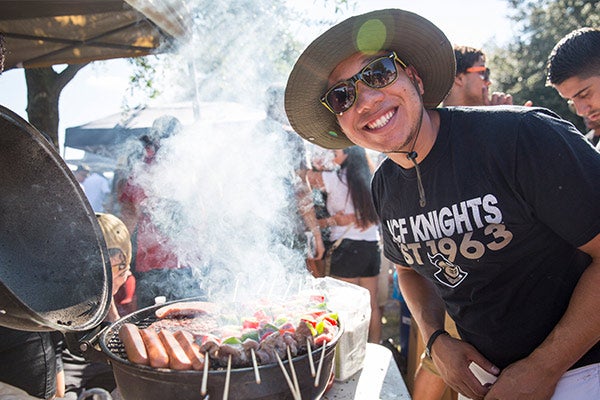 Male UCF fan tailgating.