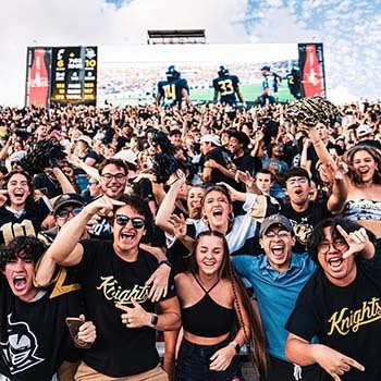 UCF Knights cheer on the football team