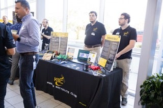 UCF students at KSnights Satellite Club booth representing the club