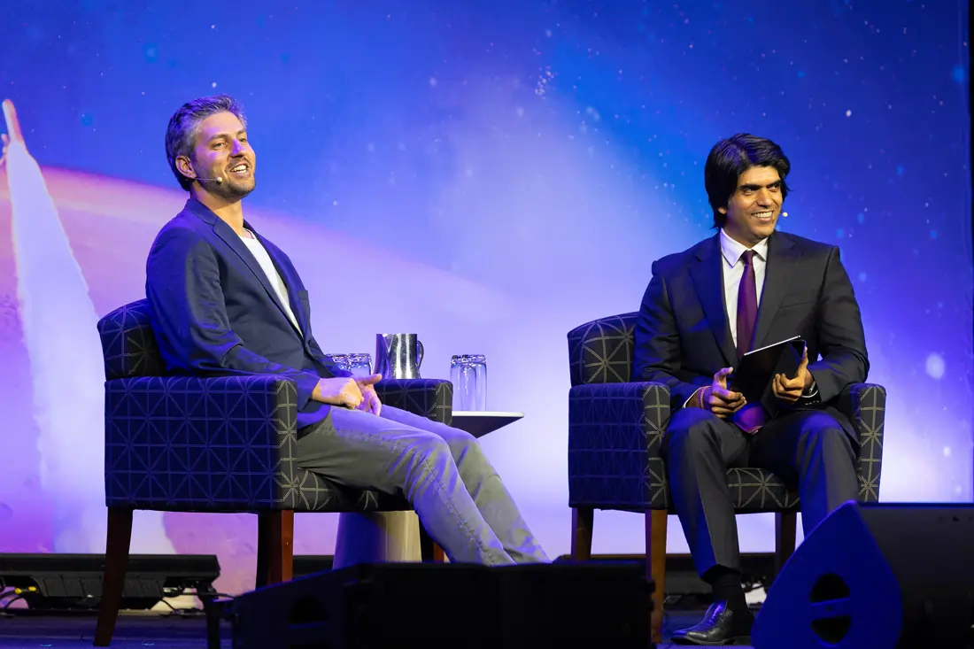 Kiko Dontchev seated in conversation during a fireside chat at the Economist Space Economy Summit in 2025.