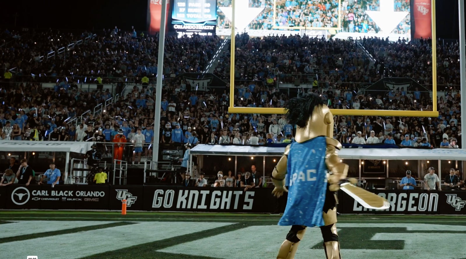 A gold-out crowd fills Acrisure Bounce House under the lights on a Saturday night.