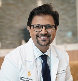Portrait of Mehul Patel, assistant professor of medicine and UCF Health ophthalmologist