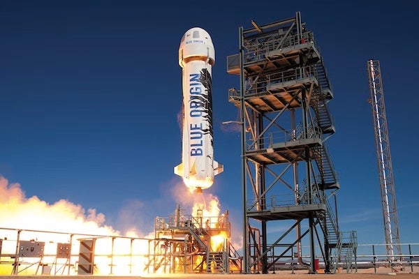 Blue Origin rocket launching.