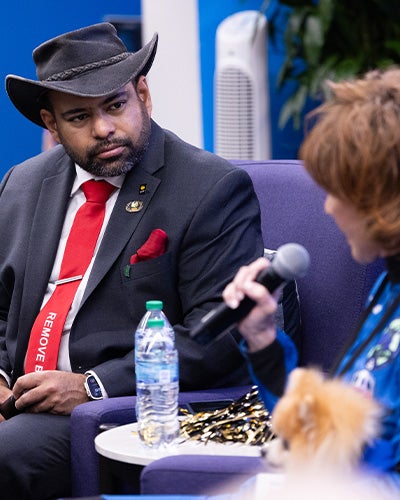 Zaheer Ali listens during a panel discussion