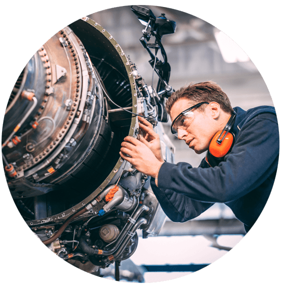 Engineer looking at an engine