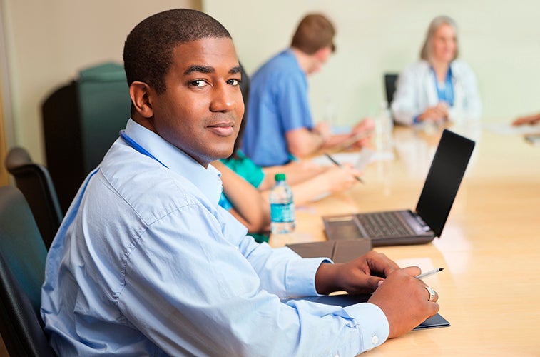 Hospital Administrator in meeting