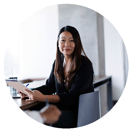 Woman at desk.