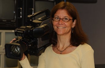 Lisa Mills is an assistant professor in UCF's Film Department and has worked as broadcast journalist.