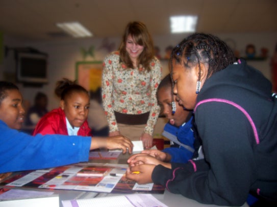VUCF has many opportunities to volunteer for community service all year. This photo portrays a student teaching children at Junior Achievement.