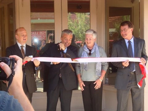 Cutting the ribbon to officially open the UCF Sanford Incubator are, from left, Bob Tunis, Sanford economic development director, Michael McLean, vice chair, Seminole County board of county commissioners, Sanford Mayor Linda Kuhn, and Dr. Tom O'Neal, associate vice president for research at UCF.