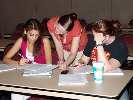 3 female students studying together