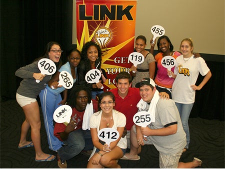 Students pose for a photo at the LINK Auction.