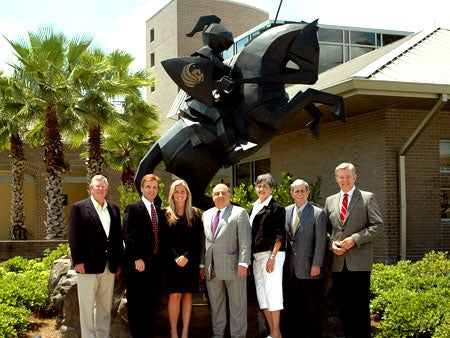 From left to right: Paul Gregg, '74 and '76; Dr. Cameron Ford, director of the UCF Center for Entrepreneurship and Innovation; Amanda M. Crum, 2010 Joust winner; Ron Pizzuti; Suzy Crouse; Hank Crouse, '71; and Blaine Sweatt, '76.