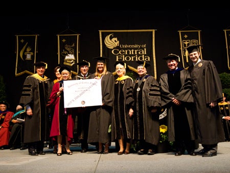 Andrea Long receives the 200,000th degree awarded in UCF's history.