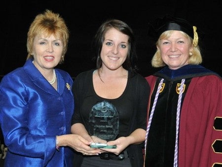 Junior Chrissy Ferrell with Anne Peach (left) and Dean Jean Leuner (right)