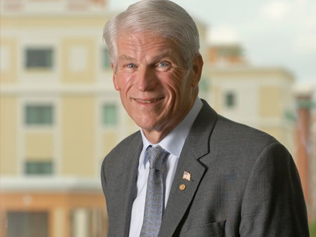 president hitt headshot in front of ucf building