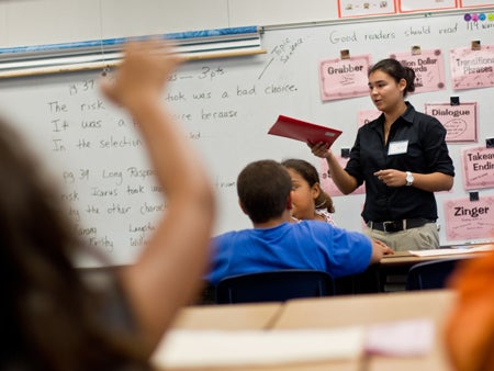 UCF honors student Lauren Ramirez speaks to a fourth-grade class at Pineloch Elementary School participating in AVID.