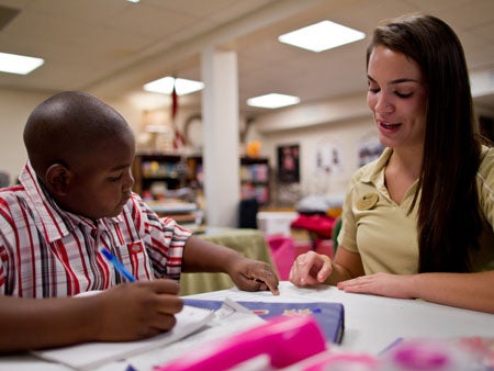 UCF students provide tutoring and encouragement to nearly 20 children each week.
