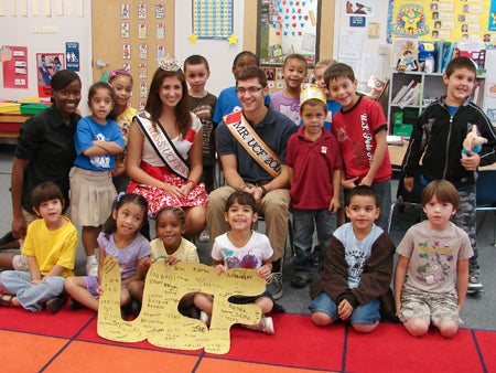 Mr. and Miss UCF, teacher Denesha Jenkins Pierre-Louis and her class