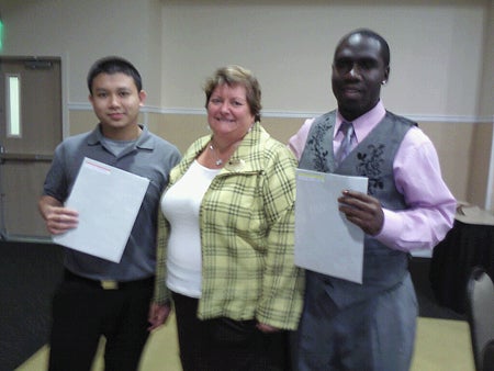 L-R: Htin Aung and Brennan Roberson, Transfer and Transition Services student assistants, with SET Committee Chair Suzi Halpin