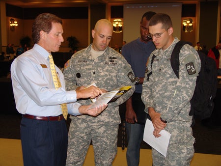 Bill Blank, Counseling Center, talks to student veterans.