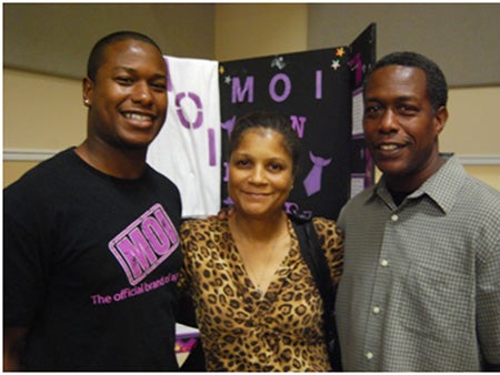 Jon Baucom with his parents at Family Weekend
