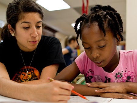 UCF Students Volunteer their time to tutor elementry school children.