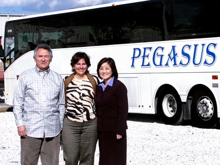 Photo above (L to R): Fernando Pereira with his wife Claudia and Eunice Choi, director of the SBDC at UCF.