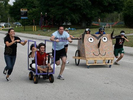 Greeks participated in a Chariot Race, a Greek game.