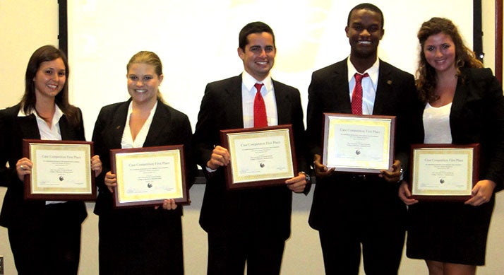 "U-Design," the winners of the 2011 Capstone Case competition. Keristen Black, Melissa Blette, Michael Chandiramani, Krista Forti and Michael Newman.