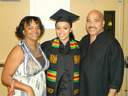 Summer 2011 graduate Lisa Cunningham with proud parents