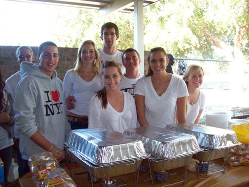 LEAD Scholars at the food station.