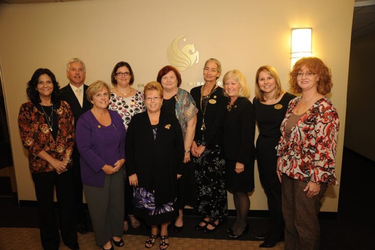 Dean Jean D'Meza Leuner (third from right) with new Knightingale Society members (back row, left to right) Carmen Demos, ‘96, Ken Dion, ‘91, Jennifer Nygaard, Lori Forlaw, Julee Waldrop, Katie Korkosz, ‘04, Sherry MacDonald, (front row, left to right) Patty Husted, Kathy LaPorte, ‘91. (Not pictured: Ruth Fricke, Andre Allong, and Dan and Ria Voss).
