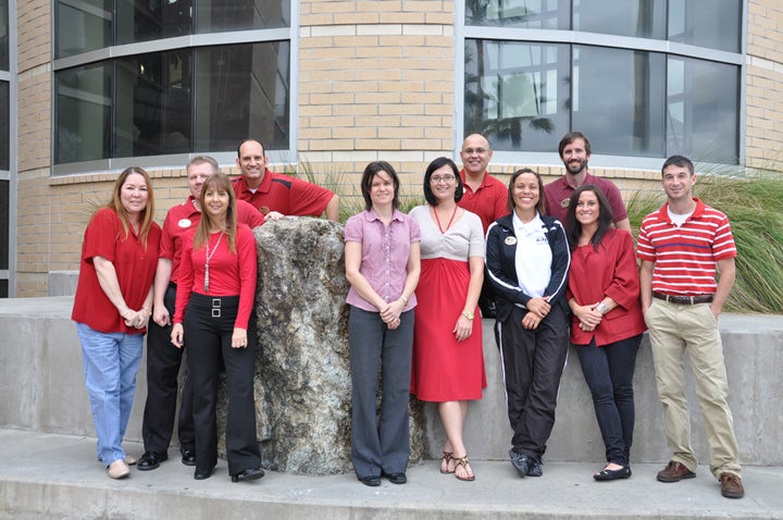 Recreation and Wellness Center staff show their support on Red Day, February 3.