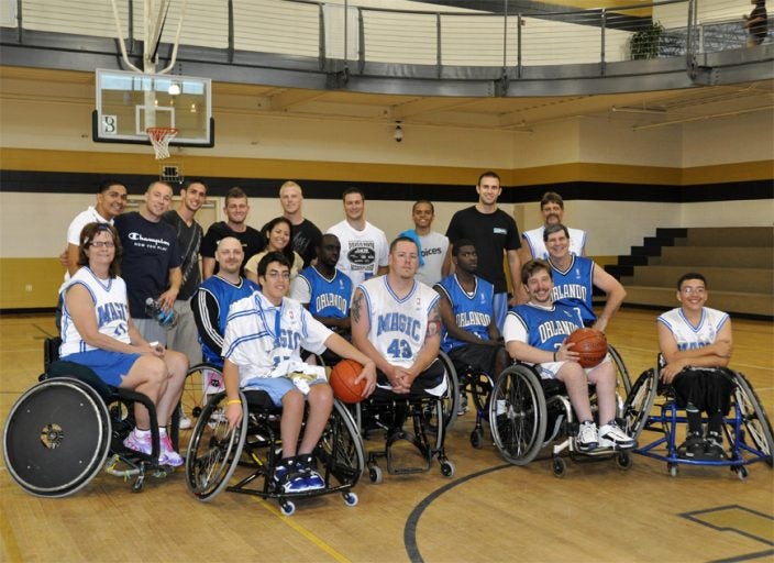 Students play wheelchair basketball at the Recreation and Wellness Center.