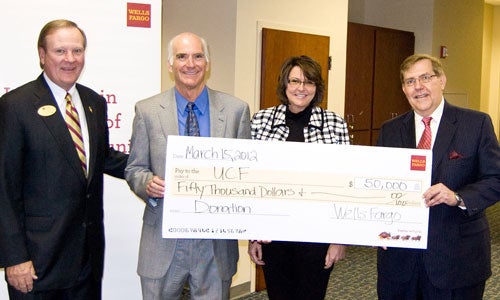 Photo (L to R): Bill Steiger, visiting instructor, CBA Department of Marketing; Foard Jones, interim dean, CBA; Larisa Perry, regional president, Central Florida, Wells Fargo; Ronald Michaels, chair, CBA Department of Marketing.