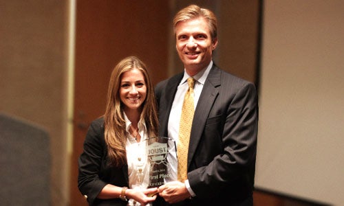 Photo: First place winner Alexandra Gramatikas with Cameron Ford, Ph.D., founding director of the Center for Entrepreneurship and Innovation (CEI). More photos from the event are available at facebook.com/ucfcba.