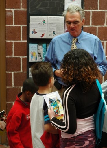 College of Education Professor Timothy Blair operates free reading camps for economically-disadvantaged children.