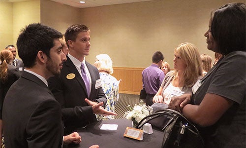 Students and alumni network prior to the Fall 2012 Career Expo.