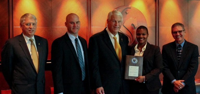 Attending the security-award presentation were: Tony Waldrop, provost and executive vice president; Mike Miller, assistant director for export compliance; President John C. Hitt; Dela Williams, facility security officer; and Doug Backman, research compliance director.