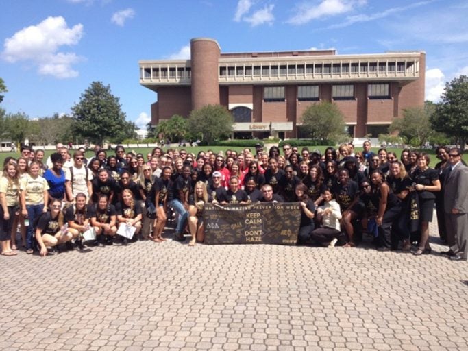 Silent March participants pose for a group photo at the Refelcting Pond.