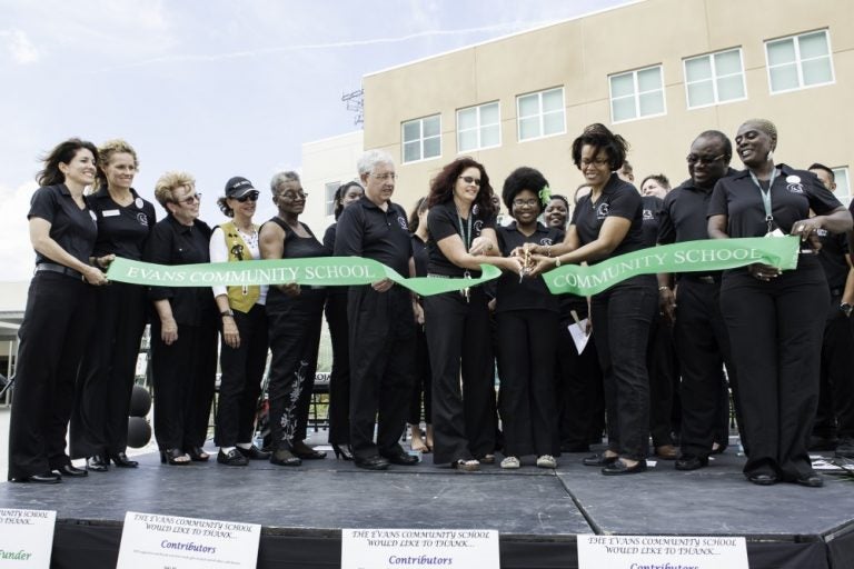 (Left to right) Amy Ellis (Evans Community School), Tara Hormell (Children's Home Society of Florida), Nancy Ellis (UCF-Center for Community Partnerships), Joan Nelson (Heart of Florida United Way), Kat Gordon (Orange County Public Schools), Michael Frumkin (UCF-COHPA), Jenny Gibson-Linkh (Evans High School), Marklyne Joachim (EHS), Barbara Jenkins (OCPS), Frank Thompson (The Worship Center Church), Charlene Sears-Tolbert (ECS). Behind Jenkins is David Bundy (CHS-FL). (Photo by Abi Bell)